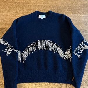 Elegant Navy Sweater with sparkling fringe.